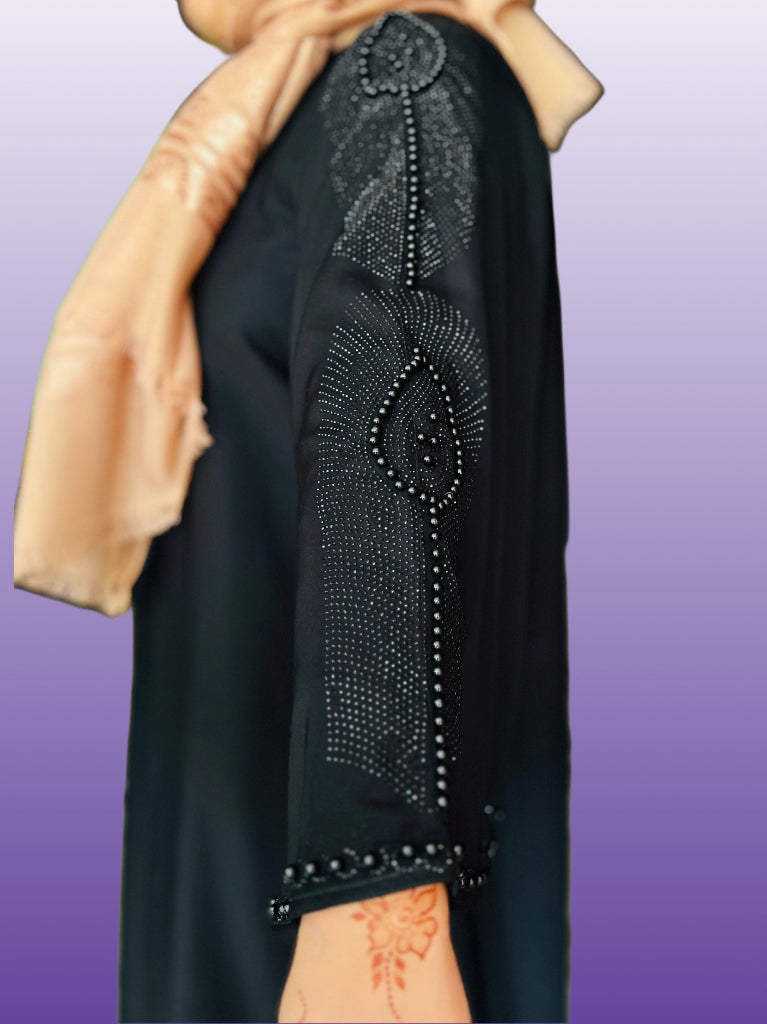 Black abaya with hand-embroidered beaded design and flared sleeved